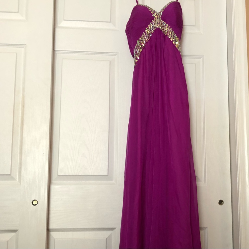 La Femme magenta and rhinestone gown